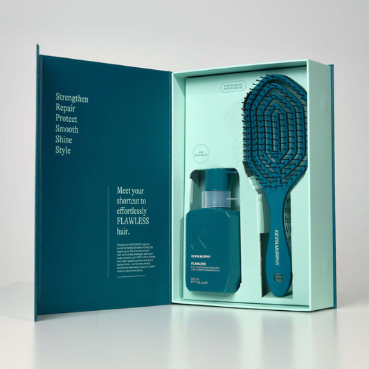 Open KEVIN.MURPHY FLAWLESS Intro Kit box showing 200ml bond-building lotion and teal detangling brush