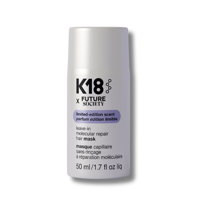 K18 x Future Society hair mask bottle on a purple background