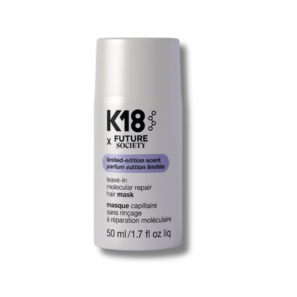 K18 x Future Society hair mask bottle on a purple background