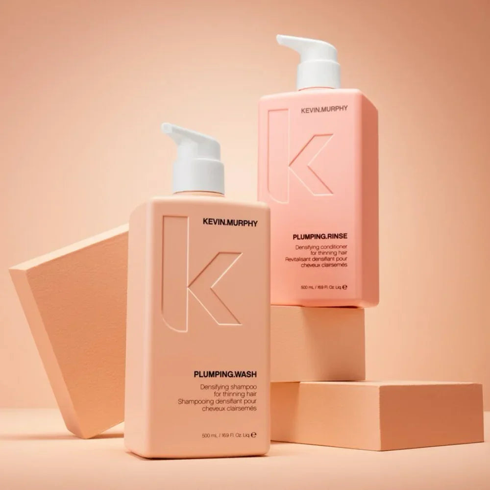 KEVIN.MURPHY PLUMPING.WASH and PLUMPING.RINSE 500ml bottles on peach blocks