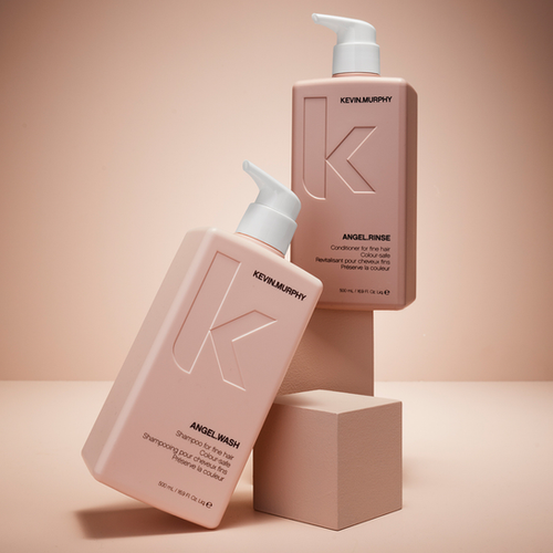 KEVIN.MURPHY ANGEL.WASH and ANGEL.RINSE 500ml pink pump bottles on blocks